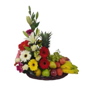 ARREGLO FLORAL CON LIRIOS, GERBERAS Y FRUTA